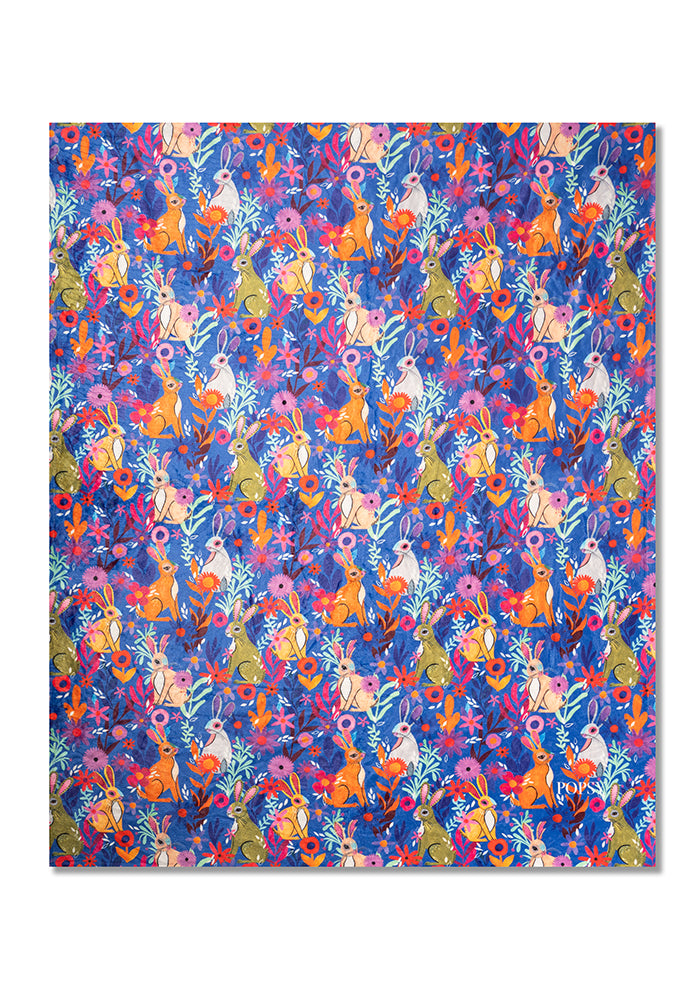 Fourth angle of Garden Bunnies Blue Print Pop-under Plush Blanket