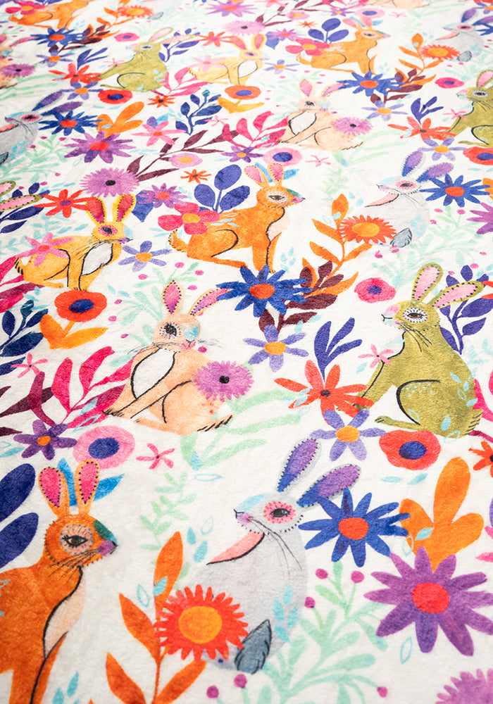 Fifth angle of Garden Bunnies Cream Print Pop-under Plush Blanket