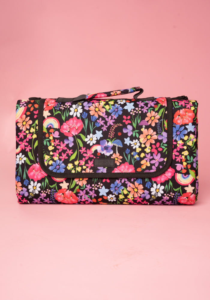 Front view of Garden Rainbow Print Foldable Popsy Picnic Blanket