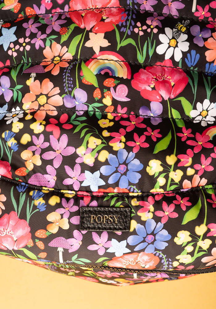 Second angle of Garden Rainbow Floral Print Popsy Cabin Bag, lightweight cabin bag with bold Garden Rainbow Floral pattern.