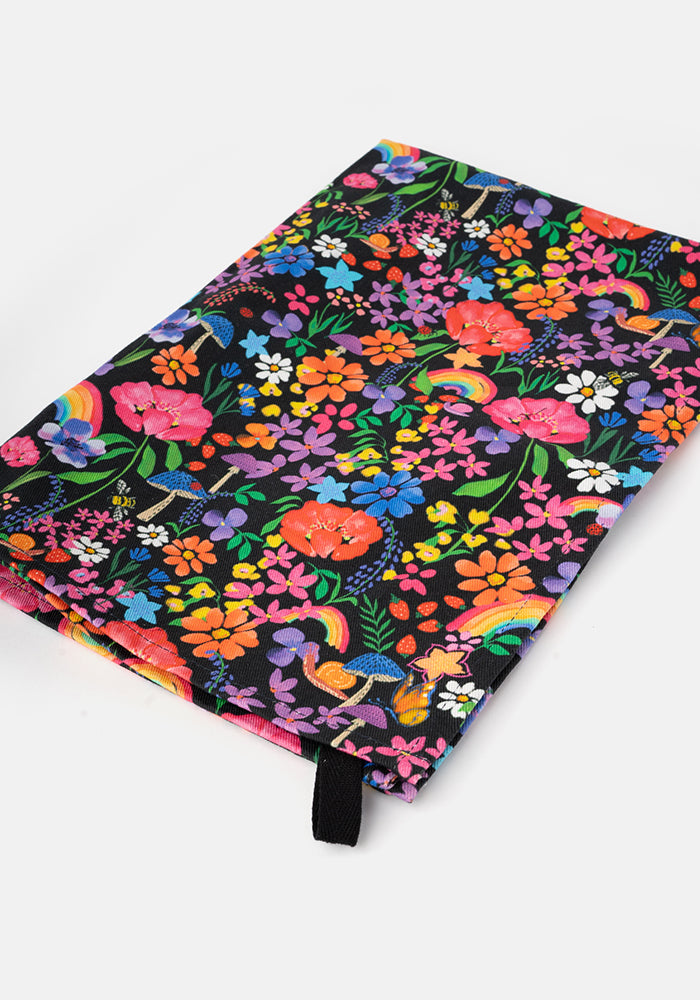 Front view of Garden Rainbow Print Popsy Tea Towel