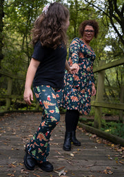 Children's Green Gingerbread Dinosaur Print Flare Leggings