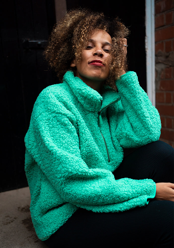Third angle of Green Borg Fleece Top