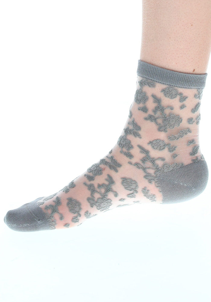 Front view of Grey Floral Bloom Sheer Ankle Socks, a sheer sock with a grey floral pattern.