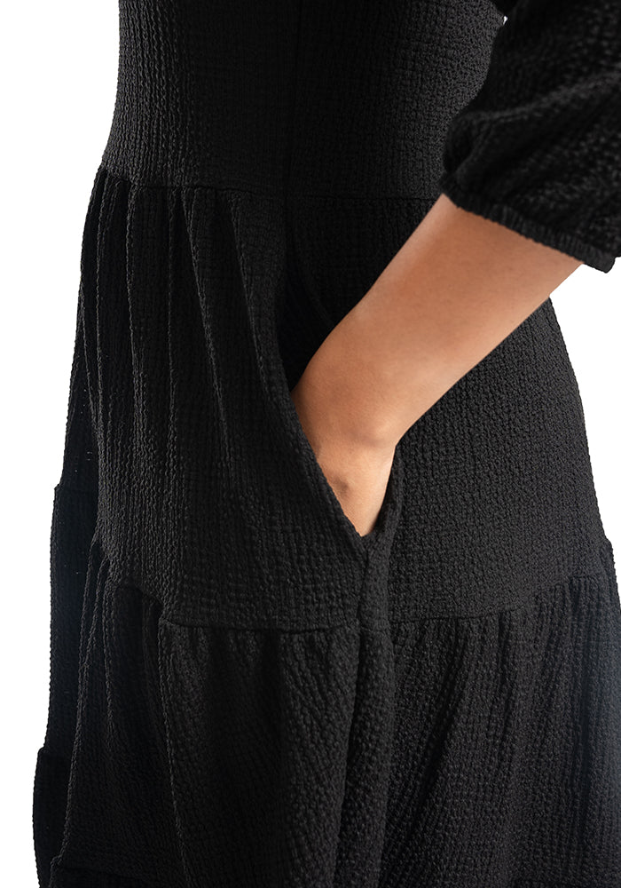 Third angle of Hattie Black Tiered Hem Dress