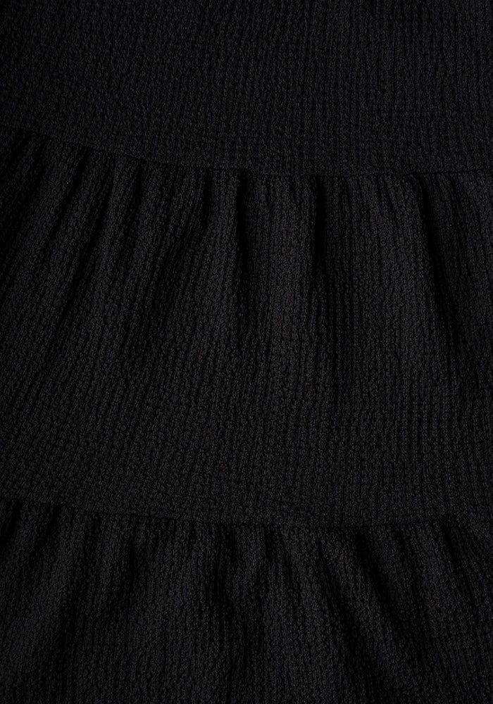 Second angle of Hattie Black Tiered Hem Dress