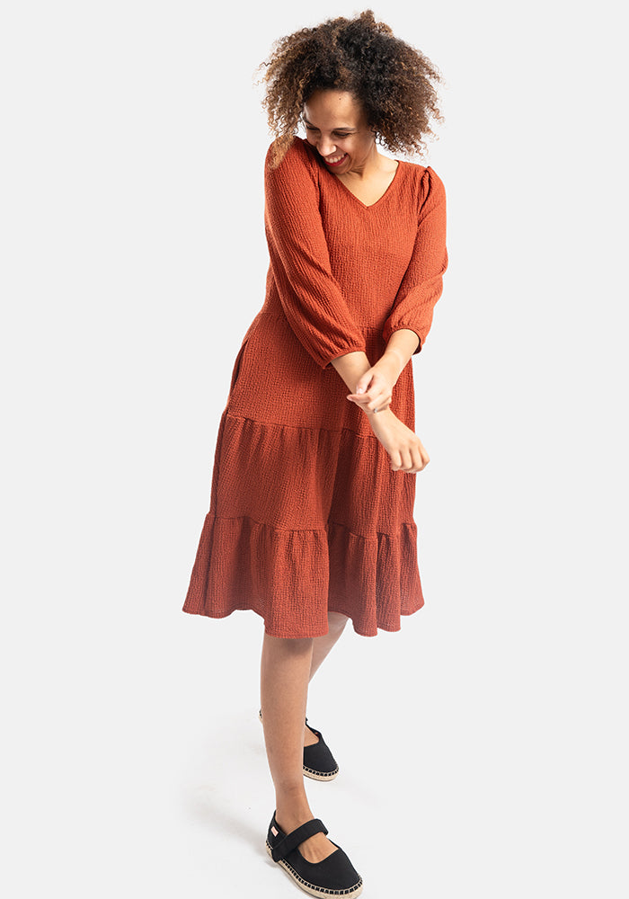 Front view of Hattie Rust Tiered Hem Dress