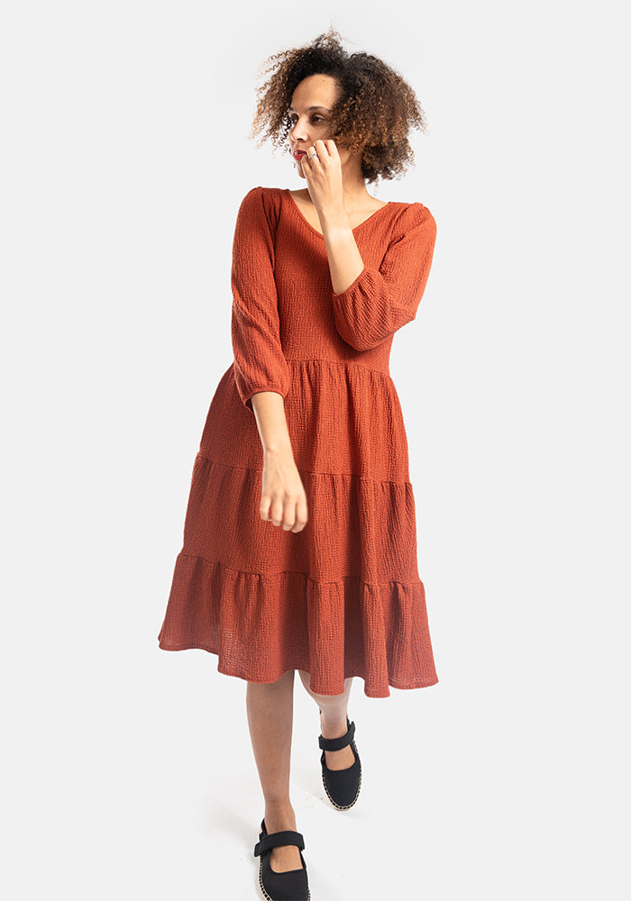 Third angle of Hattie Rust Tiered Hem Dress