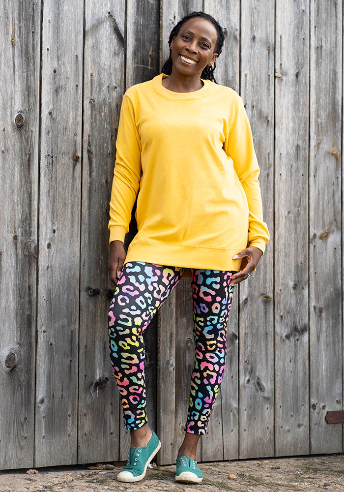 Third angle of Heath Iridescent Animal Print Leggings