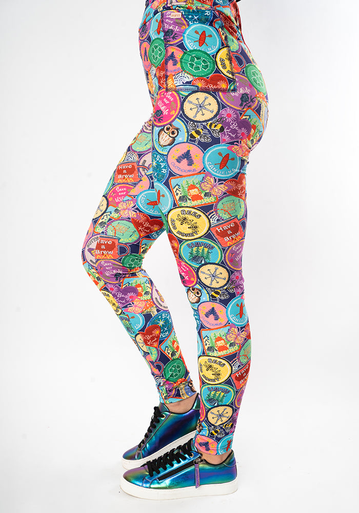 Front view of Heath Badges Print 2 Pocket Leggings