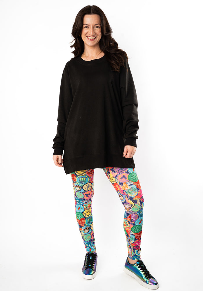 Second angle of Heath Badges Print 2 Pocket Leggings