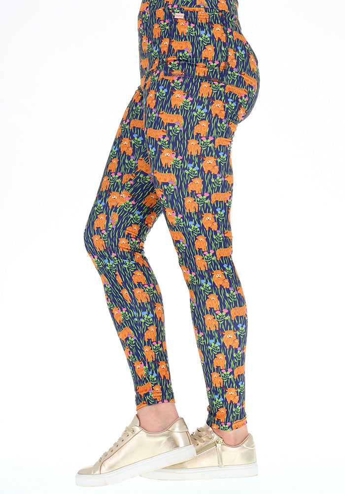 Front view of Heath Highland Cow Print Leggings