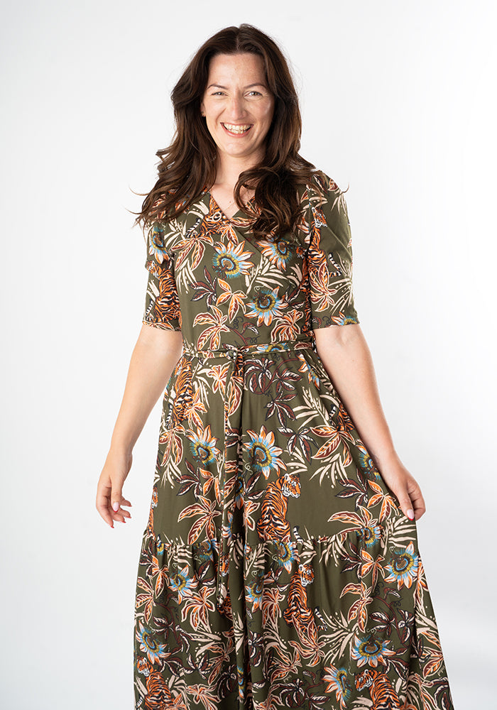 Woman wearing a floral tiger dress 