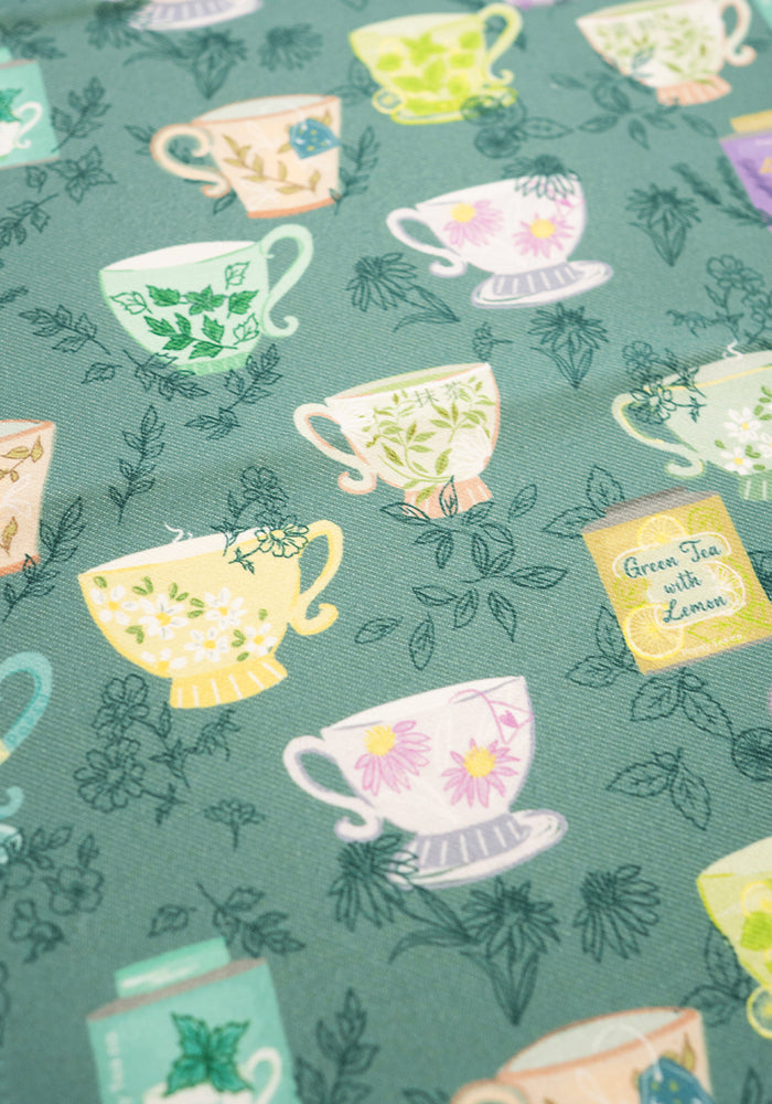 Third angle of Herbal Tea Print Tea Towel