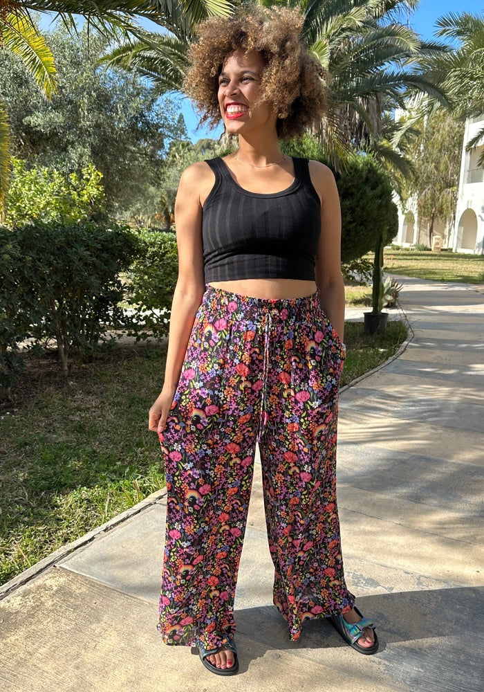 Front view of Beck Garden Rainbow Floral Print Woven Full Length Trousers
