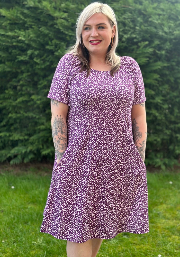Front view of Ravina Ditsy Sprig Print Trapeze Dress, our jersey is a smooth, stretchy fabric known for its comfort and ease.