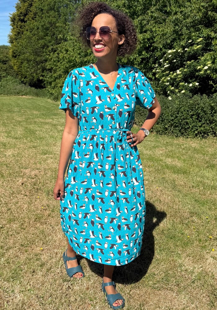 Front view of Cady Puffin Print Button Front Woven Viscose Crepe Midi Dress (Teal)