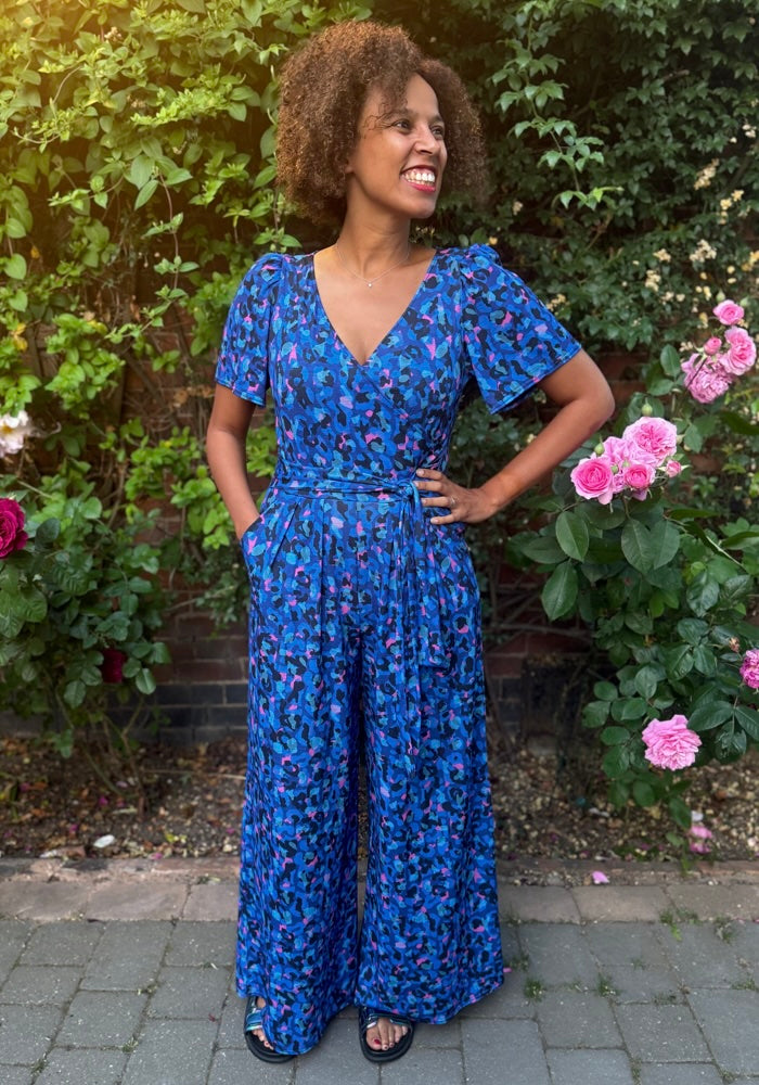 Front view of Stefaniya Abstract Animal Print Wide Full Leg Jumpsuit