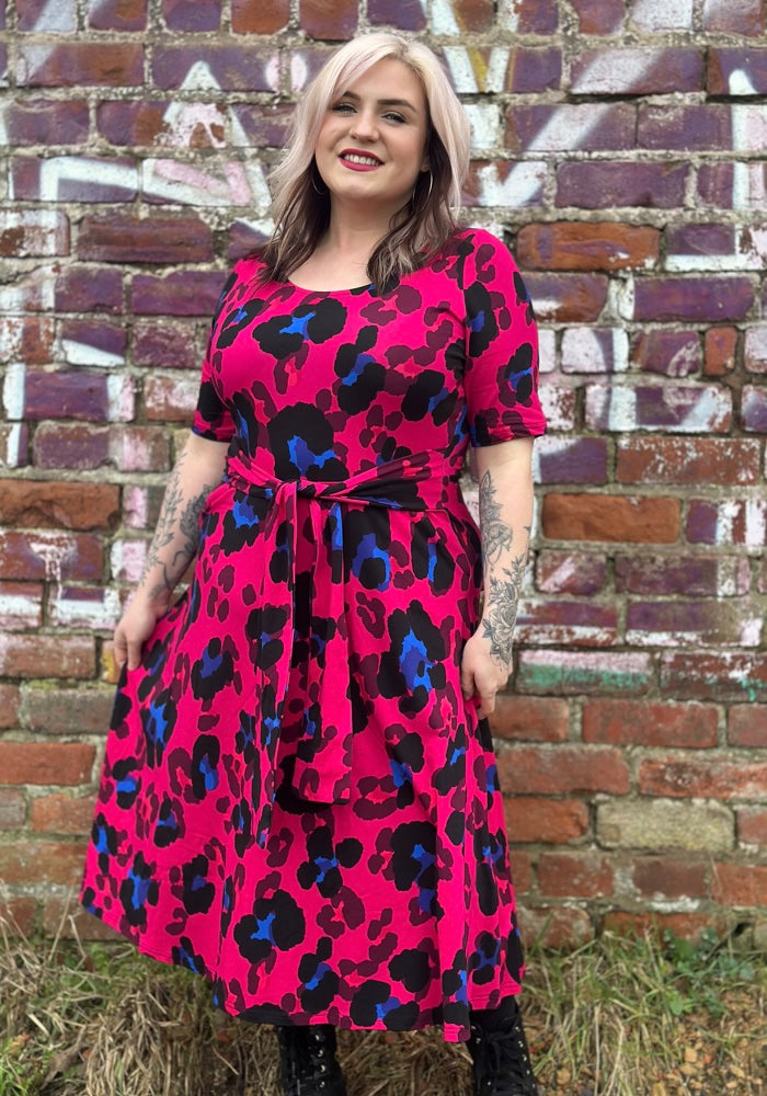 Front view of Detta Large Scale Pink Animal Print Cotton Midi Dress