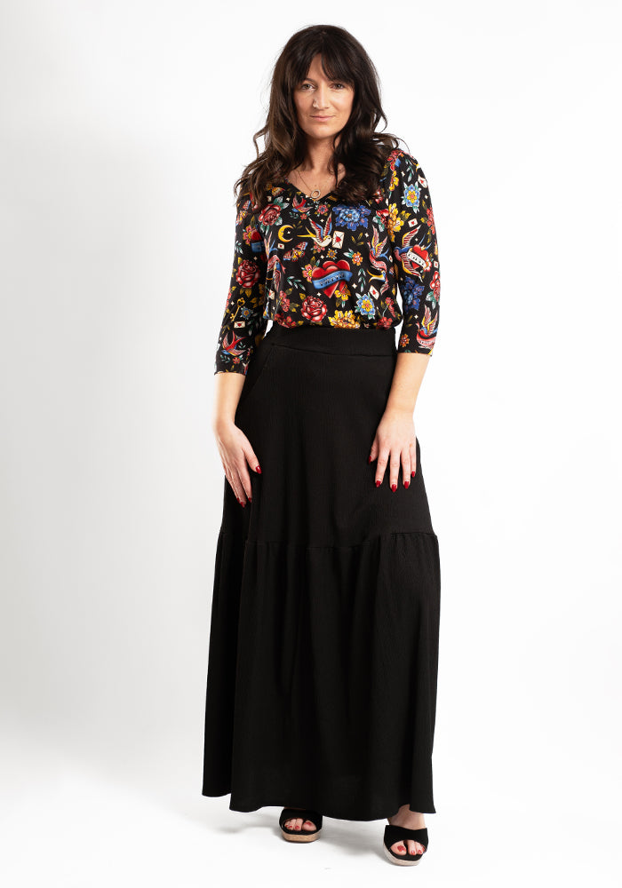Front view of Ida Black Maxi Length Tiered Hem Skirt