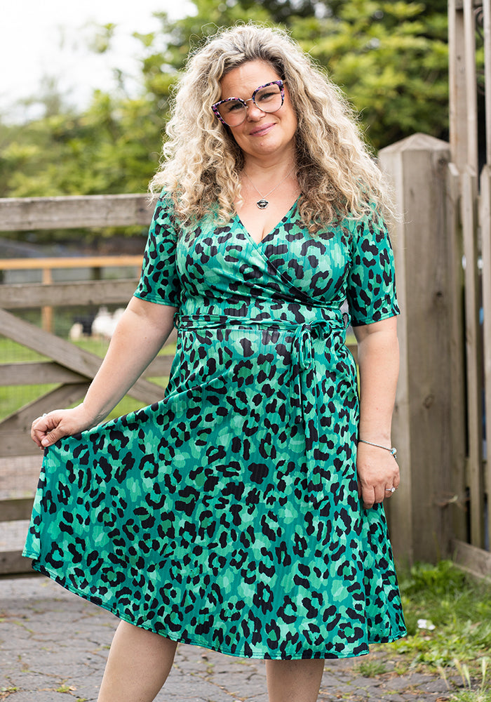 Front view of Indra Green Black Animal Print Dress