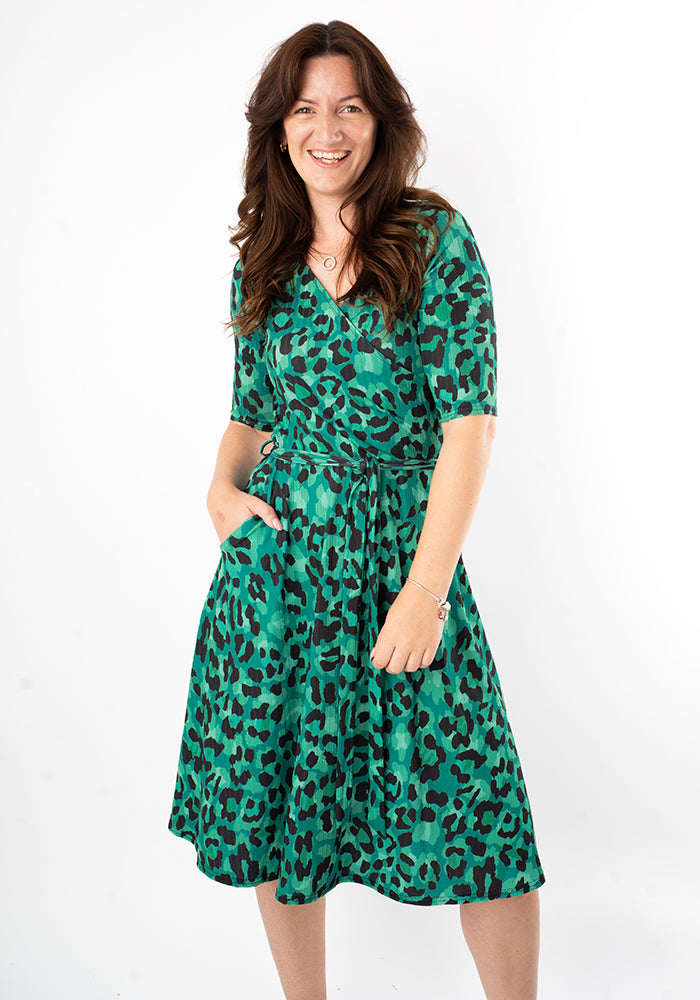 Third angle of Indra Green Black Animal Print Dress