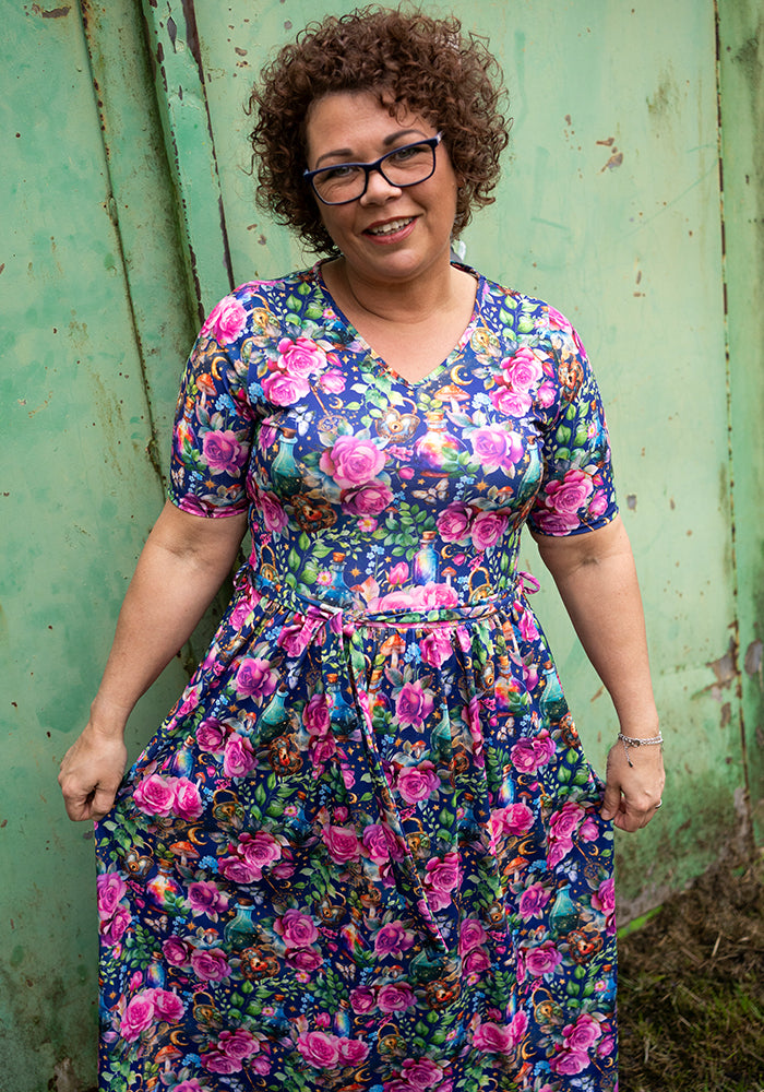 Eighth angle of Isidore Love Potion Print Midi Dress, our jersey is a smooth, stretchy fabric known for its comfort and ease.