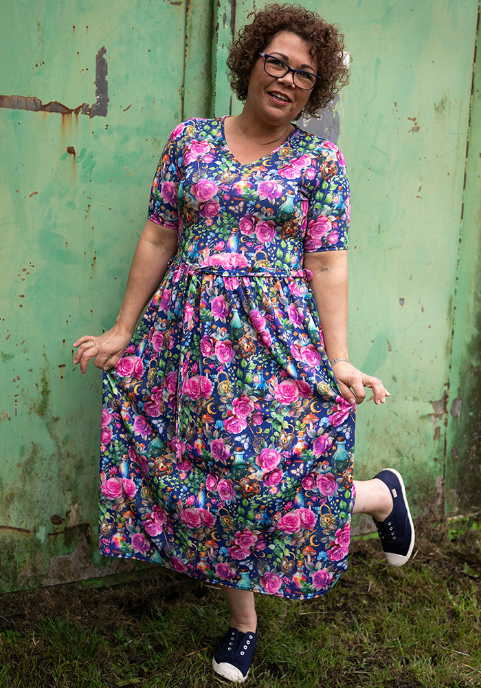 Third angle of Isidore Love Potion Print Midi Dress, our jersey is a smooth, stretchy fabric known for its comfort and ease.