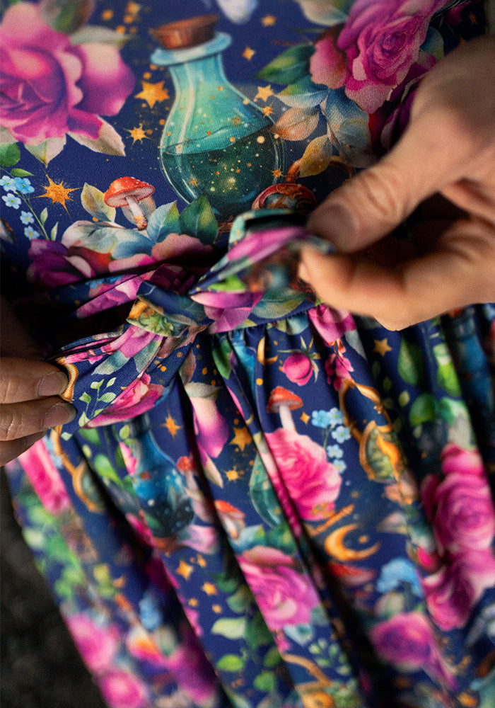 Second angle of Isidore Love Potion Print Midi Dress, our jersey is a smooth, stretchy fabric known for its comfort and ease.