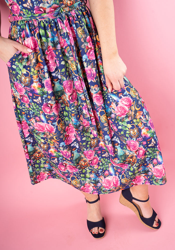 Fourth angle of Isidore Love Potion Print Midi Dress, our jersey is a smooth, stretchy fabric known for its comfort and ease.