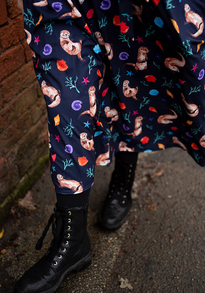 Fifth angle of Jaclyn Sea Otter Print Midi Dress, our jersey is a smooth, stretchy fabric known for its comfort and ease.