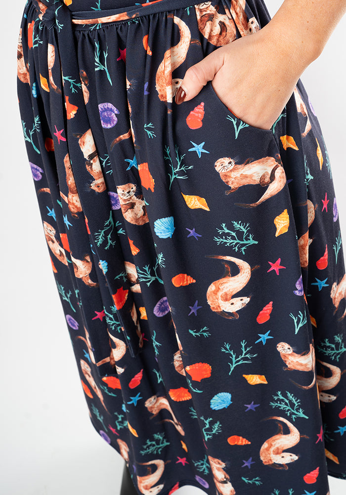 Third angle of Jaclyn Sea Otter Print Midi Dress, our jersey is a smooth, stretchy fabric known for its comfort and ease.