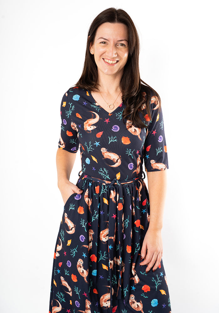 Fourth angle of Jaclyn Sea Otter Print Midi Dress, our jersey is a smooth, stretchy fabric known for its comfort and ease.