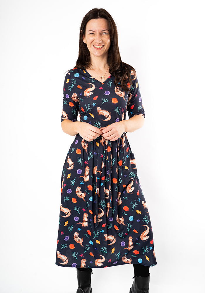 Seventh angle of Jaclyn Sea Otter Print Midi Dress, our jersey is a smooth, stretchy fabric known for its comfort and ease.