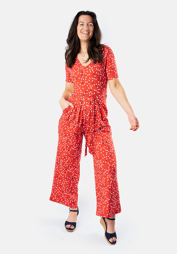 Front view of Jamille Red Ditsy Heart Print Cotton Culotte Leg Jumpsuit