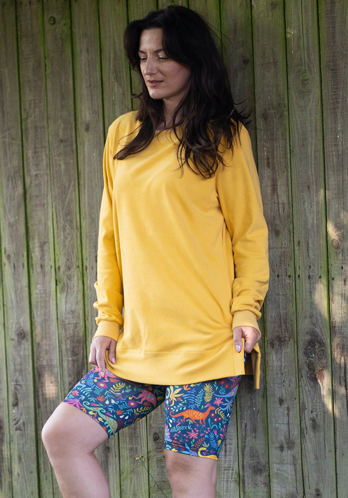 Third angle of Kiva Dinosaur Print Cycling Shorts