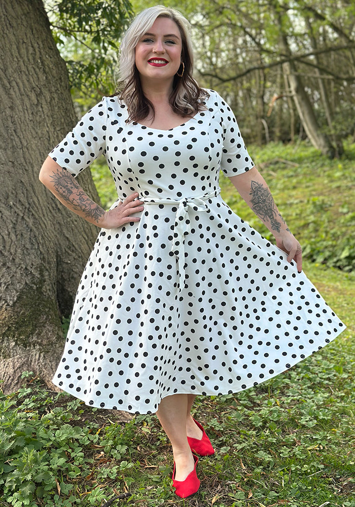 Front view of Liberty Mono Polka Dot Print Scuba Crepe Swing Dress