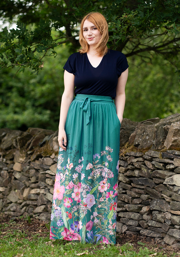 Front view of Lila-Jane Meadow Border Print Maxi Skirt