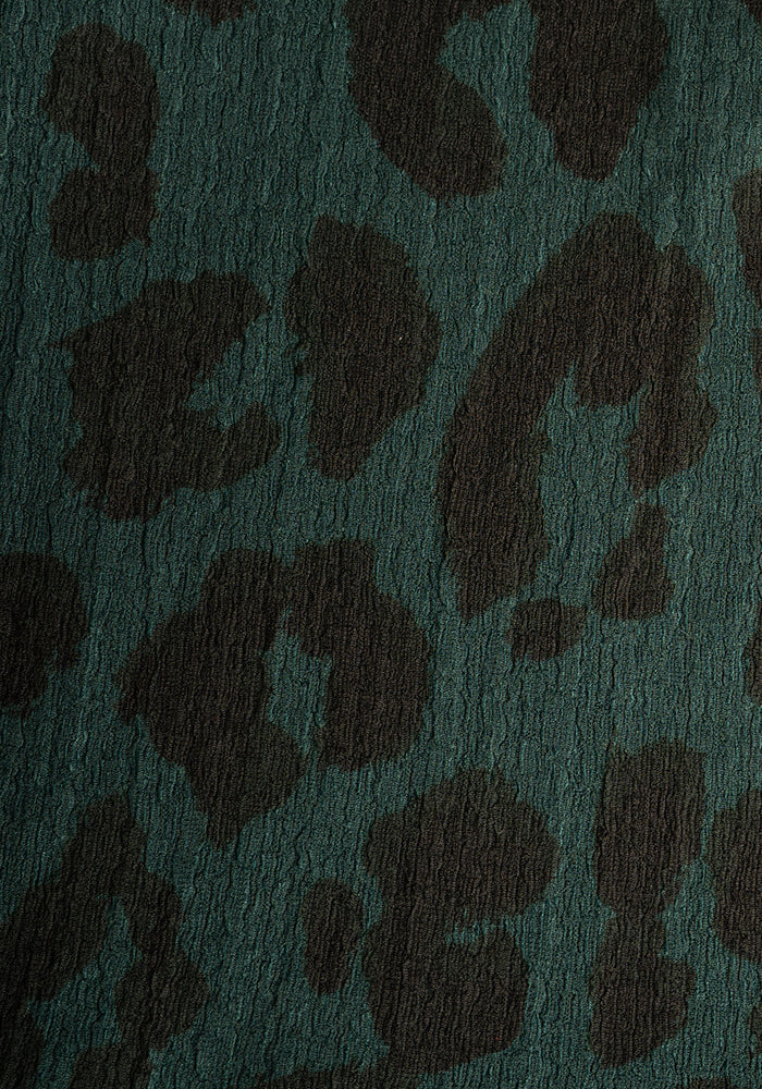 Second angle of Deia Bottle Green Animal Print Peplum Top