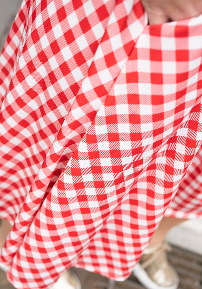 Fifth angle of Luce Red Gingham Check Print Dress, our jersey is a smooth, stretchy fabric known for its comfort and ease.