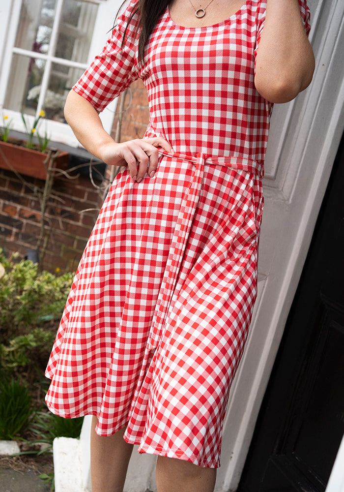 Fourth angle of Luce Red Gingham Check Print Dress, our jersey is a smooth, stretchy fabric known for its comfort and ease.