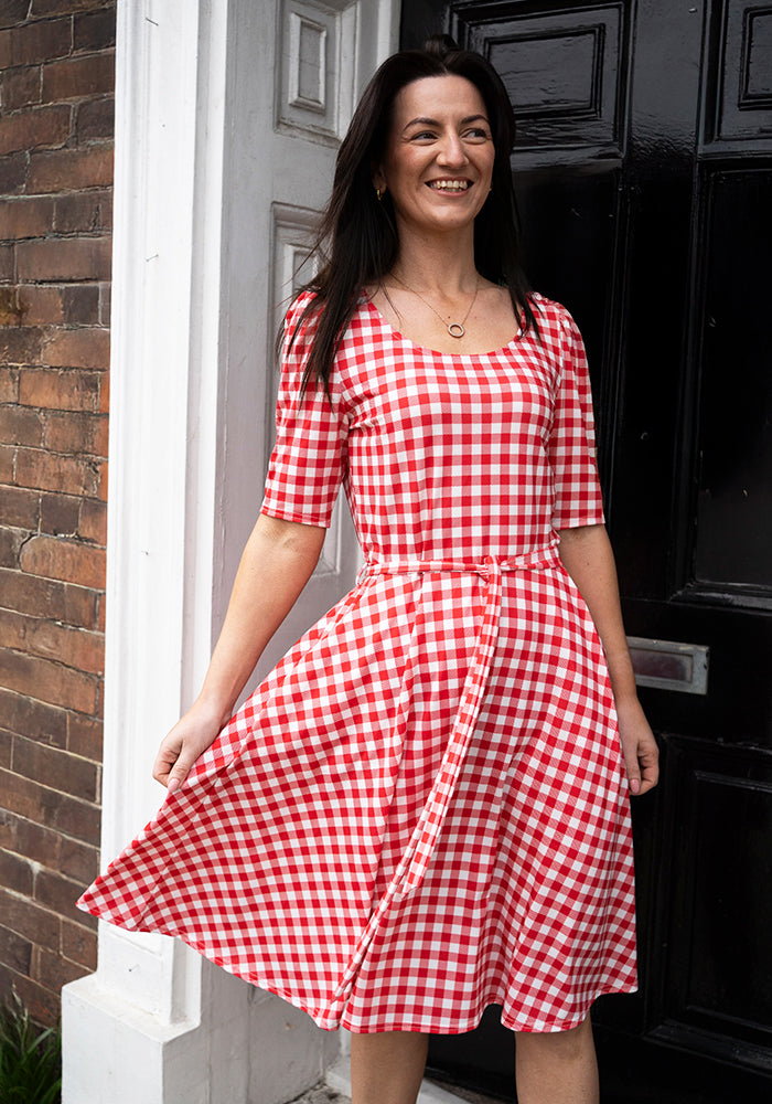 Third angle of Luce Red Gingham Check Print Dress, our jersey is a smooth, stretchy fabric known for its comfort and ease.