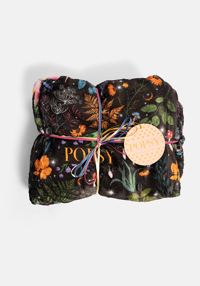 Front view of Pop-under Black Magical Moth Print Plush Blanket