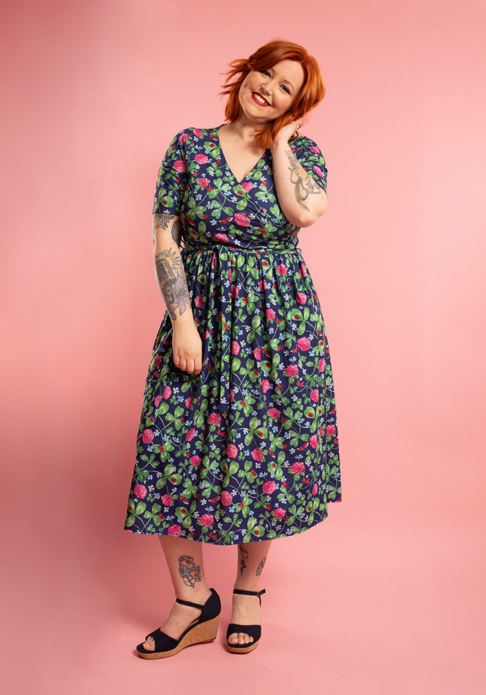 Front view of Maura Shamrock And Ladybird Print Midi Dress