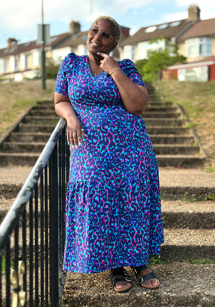 Front view of Meredith Layered Animal Print Tiered Hem Cotton Midaxi Dress