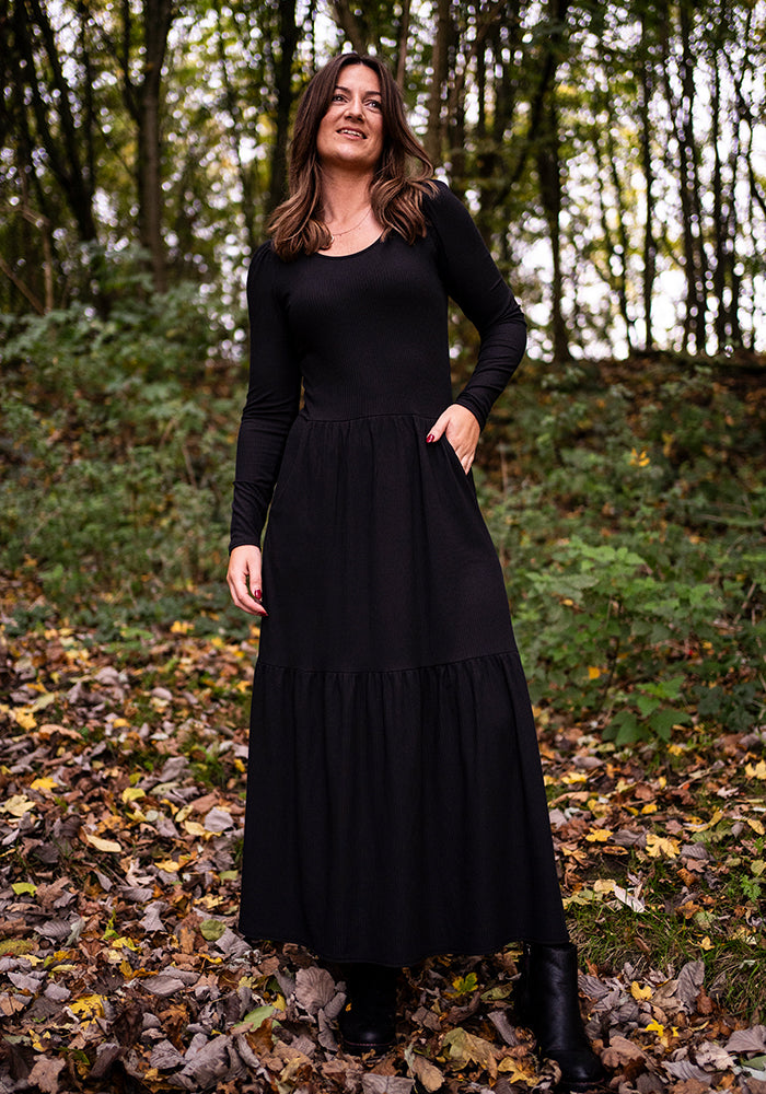 Front view of Mena Black Tiered Hem Midaxi Dress