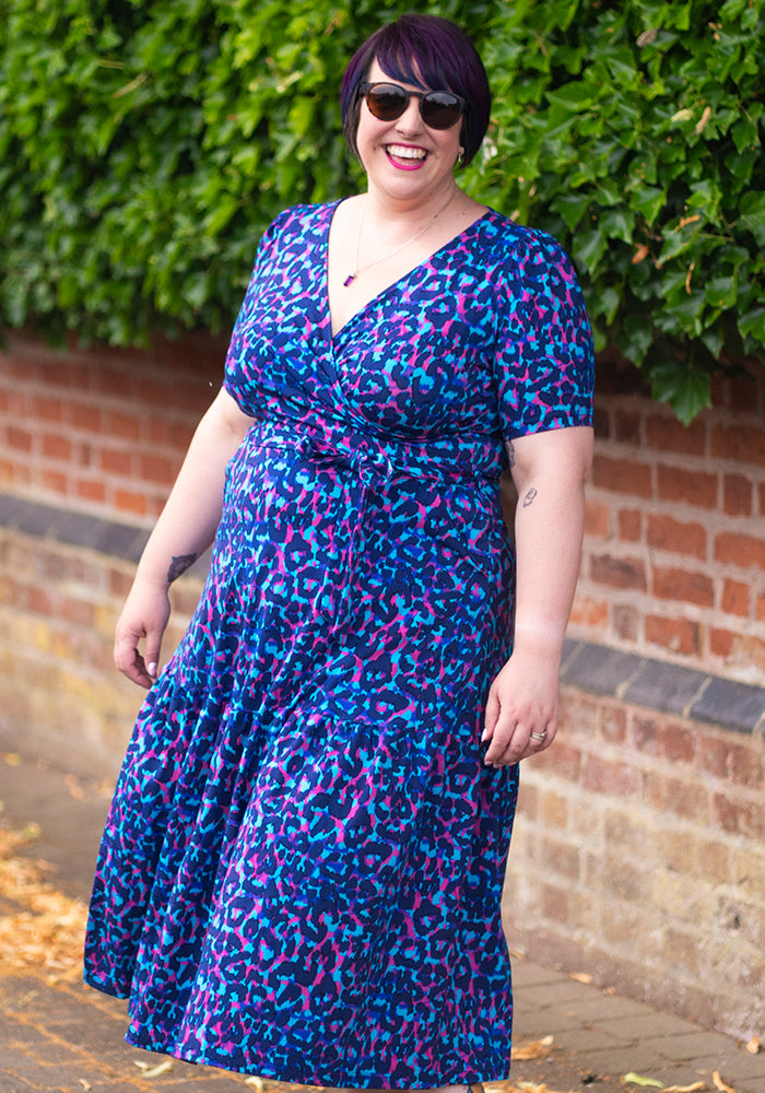 Third angle of Meredith Layered Animal Print Tiered Hem Cotton Midaxi Dress