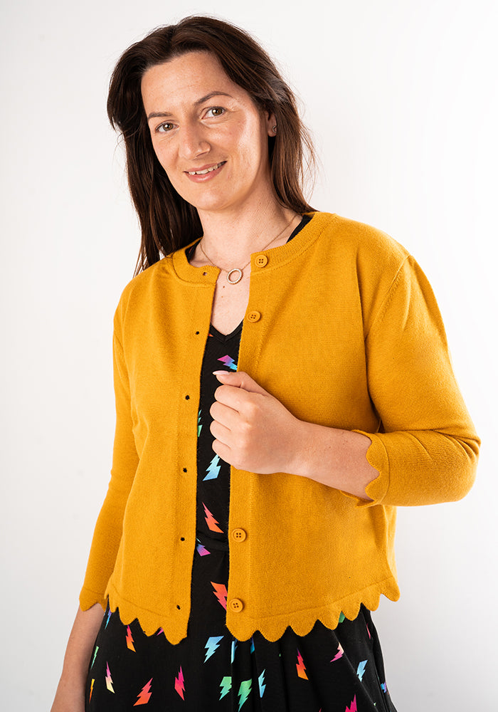Front view of Mustard Fine Knit Scallop Cardigan