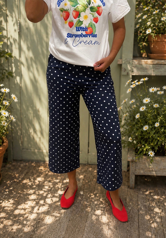 Front view of Nica Navy and Ecru Polka Dot Culotte Trousers
