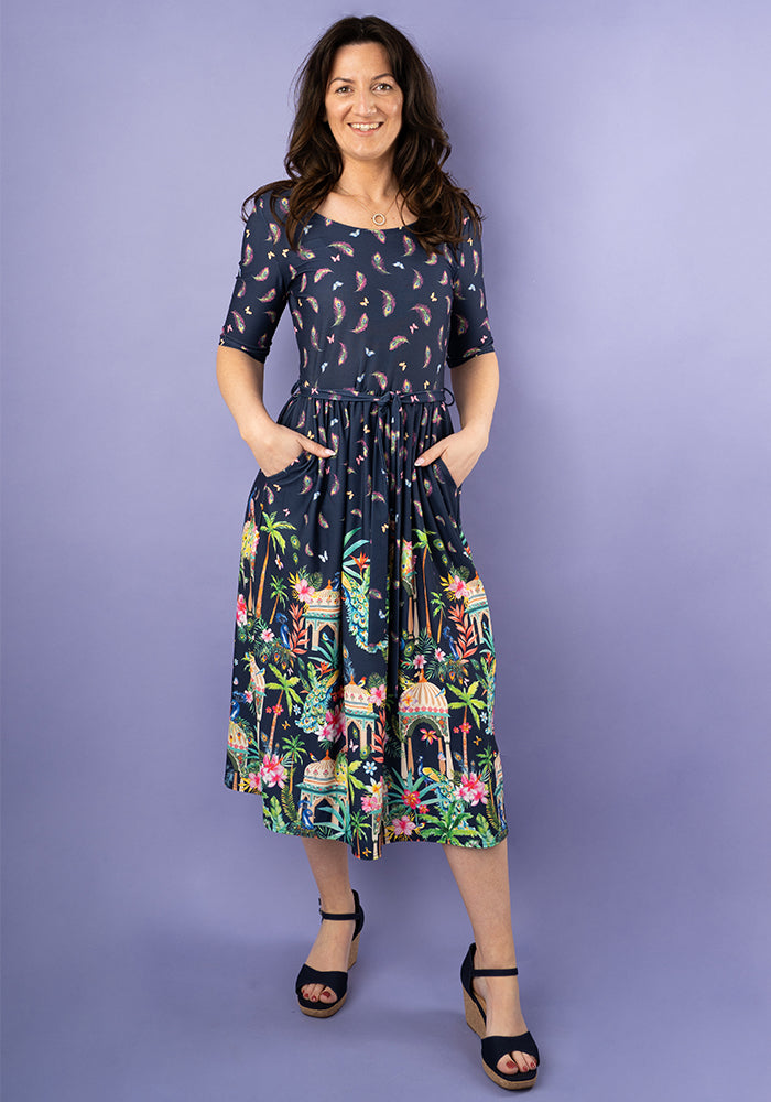 Front view of Nila Peacock Palace Border Print Midi Dress